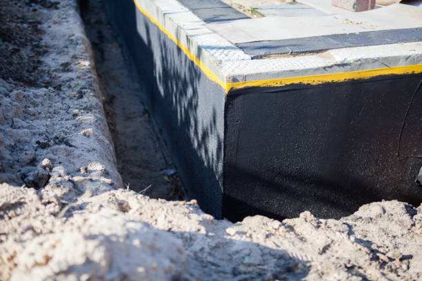 Professional Waterproofing technician working in Wilsonville, OR